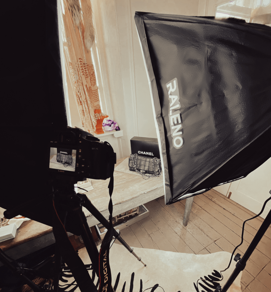 Camera and lighting setup at a Cotswolds Content photoshoot in a vintage shop in Tetbury. The subject is a black Chanel bag.